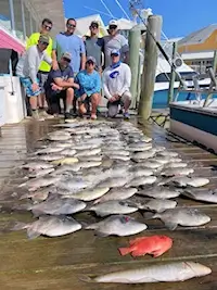 Hatteras charter group shows off their catch.