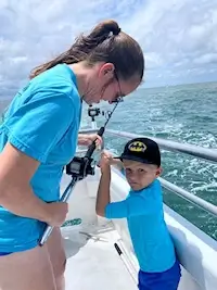 Mother and son enjoying fishing on Stormy's deck.